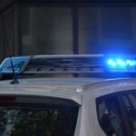 Police car at the scene of a car accident, representing law enforcement response in auto accident cases handled by Giddings Law Group in Brandon and Hillsborough County, Florida.