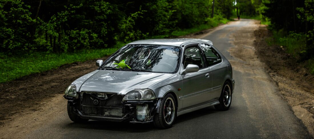 A Silver car on the Road