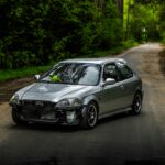 A Silver car on the Road